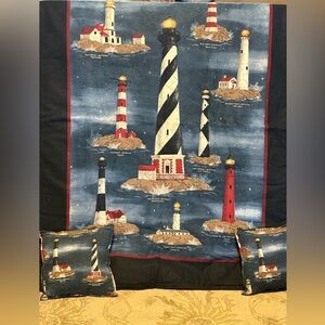 Lighthouse reversible accent piece (42x32) with 2 matching sq pillows (9x9).